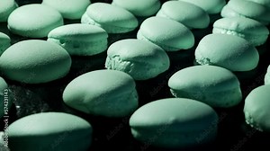 Failure of baking macarons. Baking blue macaroons in electric oven. Exploded macarons. Failed process. Timelapse of growing macarons. Delicious dessert. Mistake in process of cooking macaroons