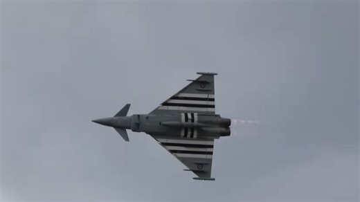 RAF Typhoon roars low over Duxford - crowd feels the shockwave