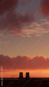 Aerial flight at sunset of a nuclear power plant in Doel. Belgium