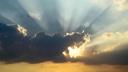 Aerial view. The drone flies over foggy and fluffy clouds. Blue sky sun and sea fog. Abstract aerial nature summer ocean sunset sea and sky background. Vacation, vacation and holiday concept