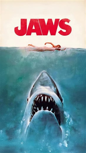 How the Iconic Jaws Poster Was Born The Jaws poster didn’t start as the legendary image we know today. Early designs were rejected until art director Alex Gotfryd suggested adding a swimmer above the shark sketch. Illustrator Roger Kastel then refined the great white by studying real specimens at the Museum of Natural History. His final artwork—an innocent swimmer drifting above a rising monster—became the book cover, the movie poster, and one of the most iconic images in film history. | Did You