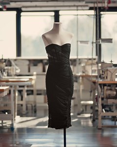 Experience the artistry that defines #DolceGabbana creations. From flawless design to the most intricate cutting and stitching, every step embodies the essence of #DolceGabbana's dedication to #MadeinItaly. Crafted with dedication, the tulle dress features an internal boned bustier with meticulously hand-inserted golden metal bones. The draping, a true testament of skilled craftmanship, is created by intertwining bands of tulle, expertly hand-stitching them to the inner base. A reflection of the