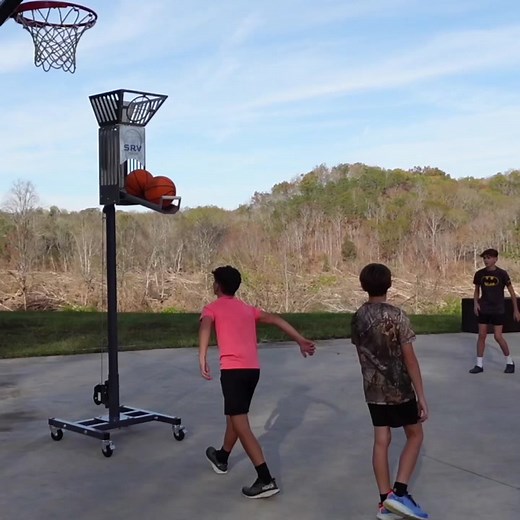 The Varsity Trainer is a basketball shooting and rebounding machine for home use. It delivers unmatched innovation, transforming players at every level. Unlock advanced training capabilities with the SRV Trainer: Varsity Trainer, a complete and versatile model designed to build fundamental basketball skills in shooting, rebounding, and vertical jumping. This shooting and rebounding machine model holds up to 5 balls and significantly expands on the Elementary configuration with powerful new featu