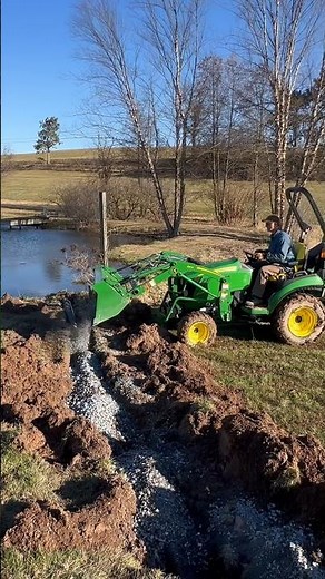 John Deere 2025R and 260B backhoe help prep the area for a new Patio! #tractor #trenching #diy