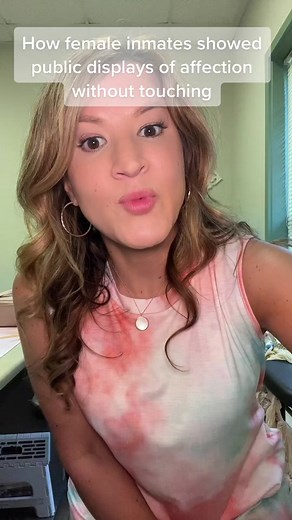 Female Inmates Showing Affection in Prison