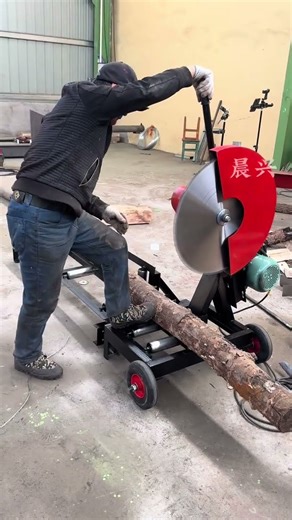 This is a hand-pressed automatic wood cutting saw. It can be used with both three-phase an