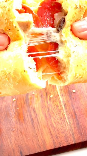 Comment 'RECIPE' for the CALZONE recipe! 🍕 That irresistible cheese pull could be yours every day. Easy to make with your favorite fillings, crispy outside, and cheesy inside. Perfect for dipping and sharing. #CalzoneLove #CheesePull | Tastes Better From Scratch