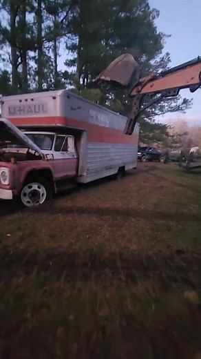 Demolishing an Old U-Haul Truck with an Excavator
