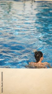 Recording a person underwater in a pool while swimming promotes fitness and wellbeing
