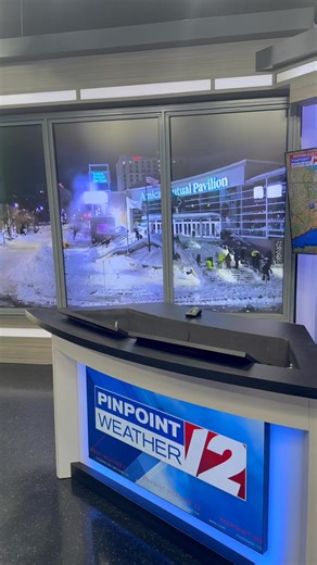 Check out the workers clearing the snow from our AMP camera this Tuesday morning! 🌨️❄️ | WPRI 12