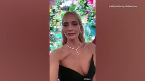 Poppy Delevingne poses in little black dress at Bulgari bash