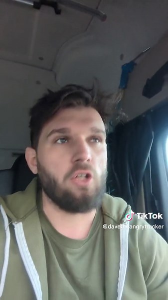 Truck Driver's Painful Strap Mishap: