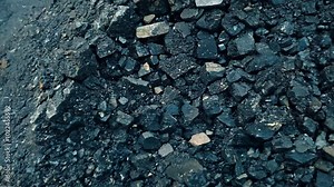 pile of mined asphalt functions as a road coating material and aggregate binder. 4K video