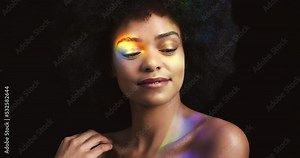 Prism rainbow light reflection, smile and black woman model with natural afro hair and lighting. Portrait of a happy female with creative lights on her face, hand and body with beauty and power