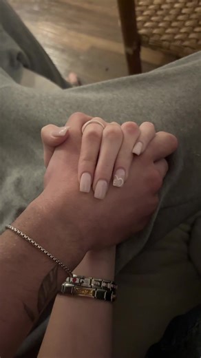 The Experience of Holding Hands: Interlinked Emotions