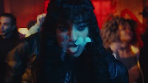 Willow Smith Confronts a Terrifying Figure in a Dingy Rock Club in 'Transparent Soul' Video