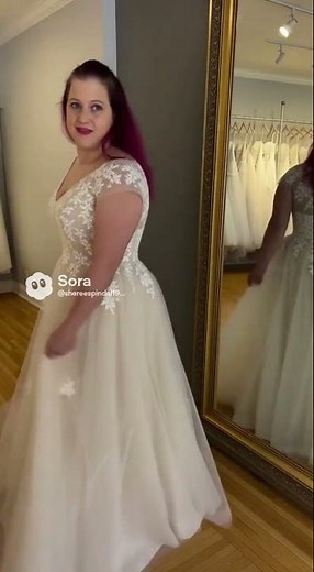 Trying on wedding dresses , bridezilla