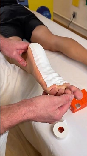 Foot taping for plantar fasciitis using Spophy Athletic tape