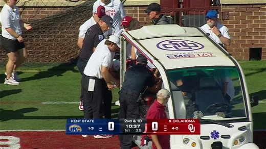 Oklahoma WR Keontez Lewis was carted off the field after a collision with the back wall. | ESPN