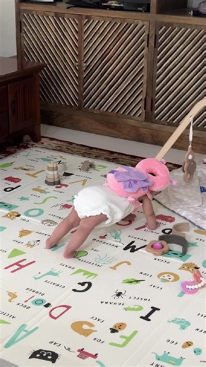 Baby loves pilates like her mommy