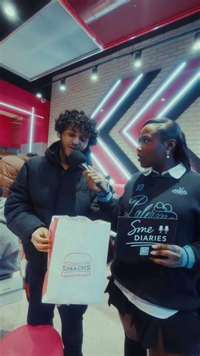 Saderobinson on Instagram: "@eat_smacks Flagship store Launch! #First bites. Real reactions. 🍔🔥 We asked, they tasted… and the verdict was LOUD. SMACKS is officially in London Victoria! 🎥 Interviews with the first few customers tasting the burgers 📍 Flagship store vibes 🎤 Hosted by SME Diaries #Smacks #BurgerReview #StreetFoodLondon #FoodieLondon"
