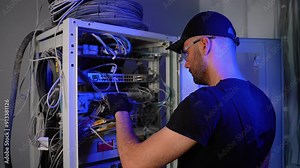 It engineer setting up server while working with data network