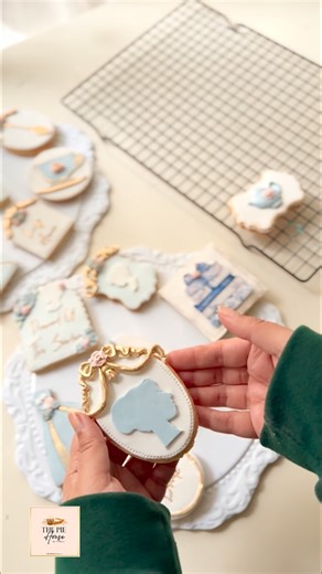 The Pie House on Instagram: "Bridgerton Themed Bridal Shower cookoes with gorgeous floral Cake ✨💍🩵✨ . . #bridgerton #handmade #customcookies #thepiehouselhr #thepiehouse"