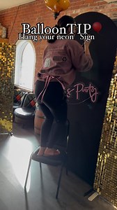Balloons TIP🎈 I use the same method I use to hang my wooden signs with my neon ! This is my best tip ever! Use fishing line and attach to a backdrop clip ! Clip the sign to your stand and cover clip with your balloons 🎈 #tips #inspo #reels #balloontip #tricks #balloonart #explore #supportsmall | Cs_partyexpress
