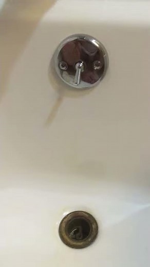 Installing linkage assembly and trip lever in bathtub
