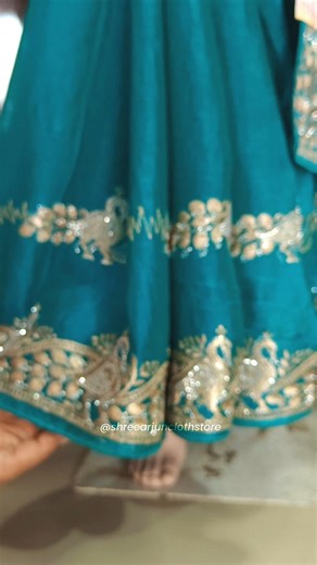 Beautiful Rama Colour Fandy Fabric Saree with Peacock Design, Zari and Silver Stone Work