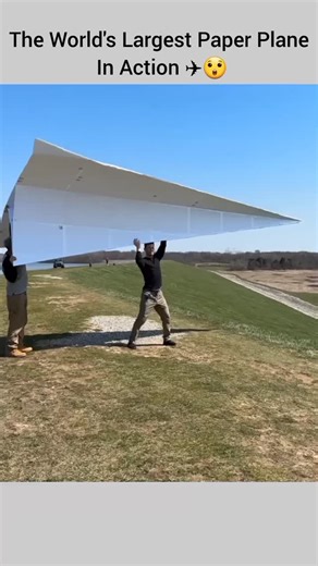 Trend Tracer on Instagram: "Giant Paper Plane Takes Flight Over The Hills ✈️⛰️ #Shorts #Aviation #PaperPlane #Viral#TrendTracer ​☁️ Gravity Defied? Watch This Massive Paper Plane Glide Effortlessly! ✈️ Launching a paper plane of this scale looks impossible until you see the perfect aerodynamic design in action. This massive craft utilizes a reinforced light-weight structure that allows it to catch the wind currents coming off the slope. The weight-to-surface-area ratio is carefully balanced so t