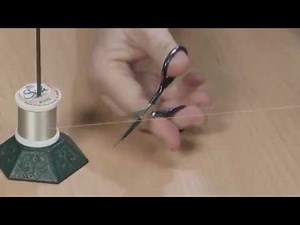 Use a Bill-spike to Stabilize a Thread Spool