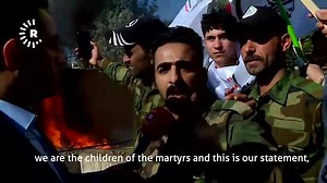 Watch this Iranian backed militiamen outside the #US Embassy threat Americans in #Iraq. For your knowledge. #Erbil is a #Kurdish city in Iraqi Kurdistan. Don't take his threats to seriously because the US soldiers and all US citizens living here are our guests and we gonna protect them until the very end. | Peshmergaswe