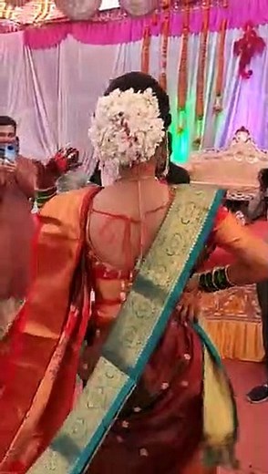 Marathi Bride Dancing for Her Groom in Their Marriage