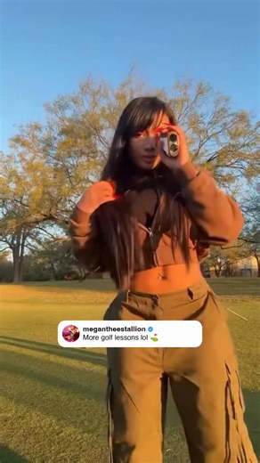 Klay Thompson out here teaching Megan Thee Stallion how to swing on the green. ⛳️❤️ | Complex
