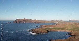 Spectacular 4K aerial video of flying above picturesque Atlantic coast at sunset, Sybil Head, Dingle Peninsula, Kerry, Ireland