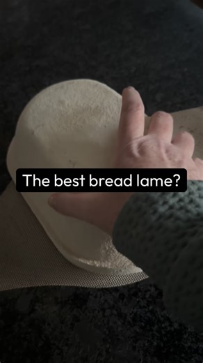 The Village Bakehouse | Ali on Instagram: "Scoring can feel intimidating when you’re just getting started, so here’s the truth that makes it a lot easier: the “best” bread lame is the one that feels steady in your hand. I’ve tried so many over the years, and somehow the simple six-dollar one is still the winner. Sharp blades do most of the work anyway—clean cuts come from a clean edge. If you want the exact lame and blades I use, comment LAME and I’ll send the links straight to your DMs. Other t