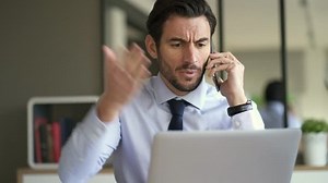 Businessman being angry on the phone