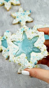 30K views · 368 reactions | Snowflake cookies! ❄️ Use a no spread sugar cookie recipe, pipe on royal icing and dip in sprinkles. Fill the holes with isomalt (mix in glitter for a whimsical frosty look!) Tools linked to my amazon storefront-link in bio  #cookies #christmascookies #snowflakecookies #letitsnow #wintercookies #cookiedecorating #sugarcookies #holidaybaking #cookieart | Loveisbakeable | Facebook