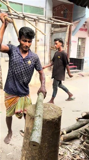 Large wooden logs can be split in seconds with a single-handed axe #hardwork #woodworking