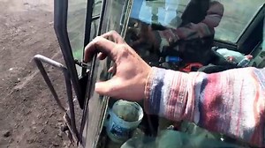 REPLACING A WINDSHIELD ON A PIECE OF HEAVY EQUIPMENT/ FRONT-END LOADER