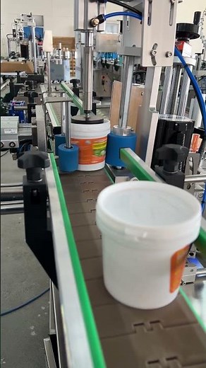 Cone barrel labeling machine