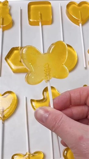 Making hard candy lollipops is not only easy, it's a lot of fun! There's something so satisfying about creating treats that look as beautiful as they taste. Find everything you need! From our stainless steel lollipop molds to flavoring oils and more on our website! Link in bio! #candysupplies #lotsoflollies #bakingsupplies #smallbusinesslove #shoponline