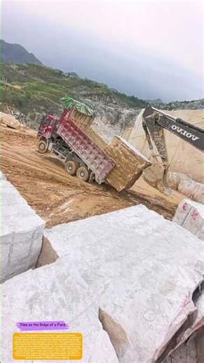 How an Excavator Matches Stone to Truck in a Mountain Quarry