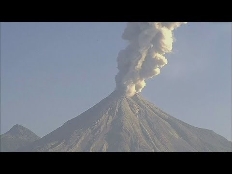 Mexico’s Colima volcano spectacularly erupts into blue sky