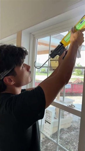 ￼ Applying caulk to window trim #painter#diy ￼