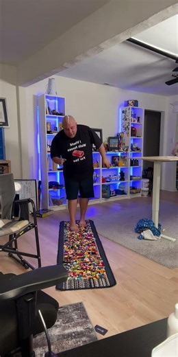 I designed my own LEGO Rug, by gluing LEGO Bricks to a carpet so I could quickly do our