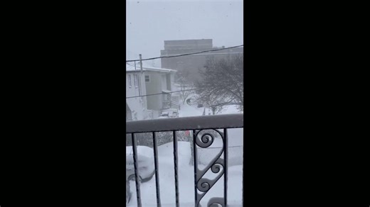 Thick snowfall blankets streets in Boston, Massachusetts, USA