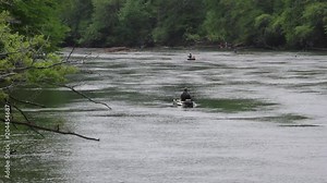 Georgia, Buford Dam Park, People fishing on the Chattahoochee River, in boats and on shore