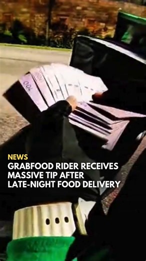SAYS on Instagram: "A GrabFood rider was left stunned after receiving an unexpectedly large tip while delivering food late at night. In a video shared by @/rafy_axl on TikTok, the customer explained that they didn’t want to break a large note as they were leaving for a trip the next day, and decided to pass the extra cash to the driver instead. Netizens praised the kind gesture, saying small acts like these make long, tiring nights on the job worth it. Follow @saysdotcom for more heartwarming st